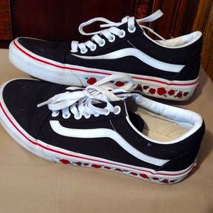 Black and white Vans with rose detail